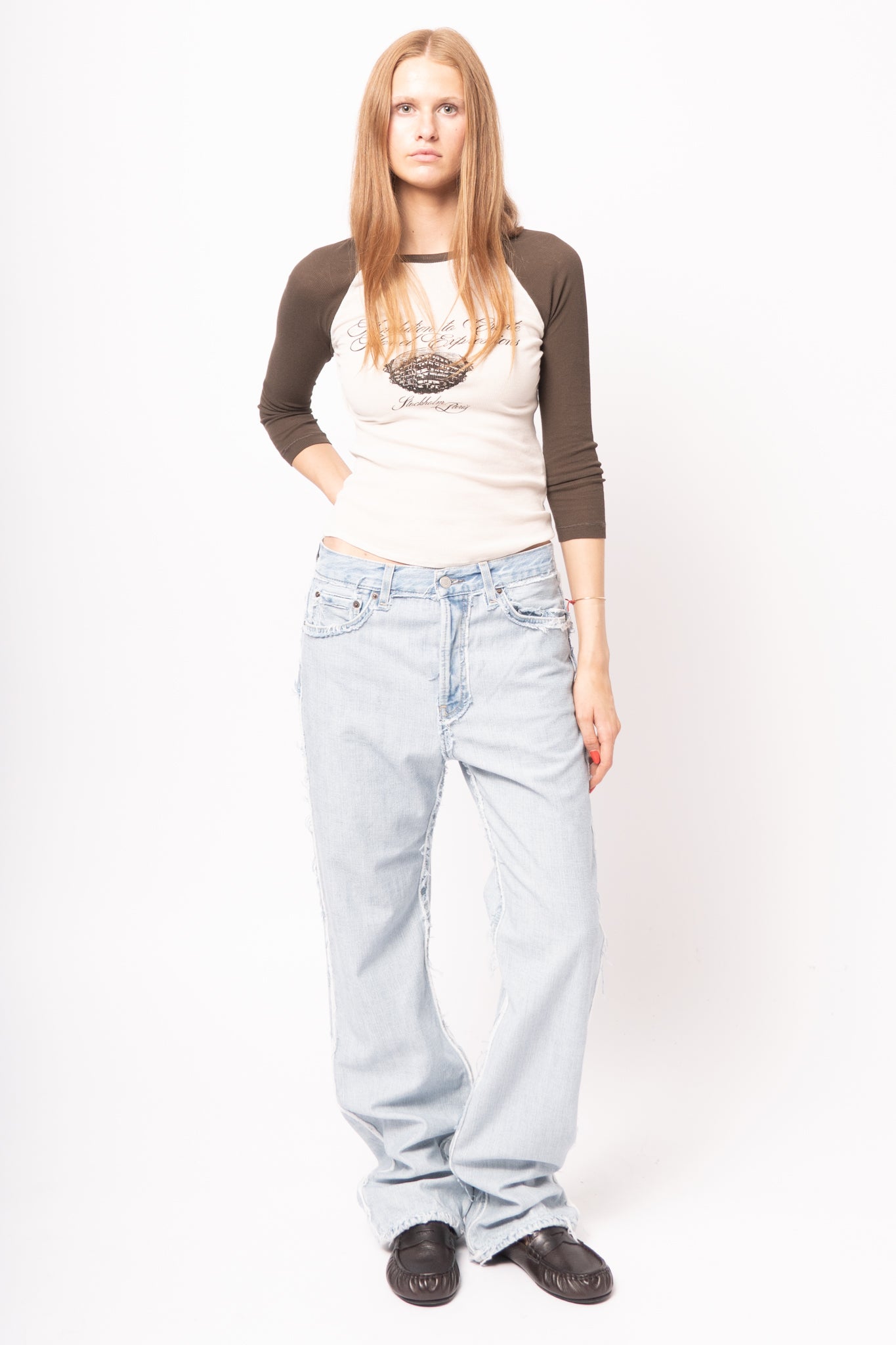 Frayed Light Blue Denim Jeans