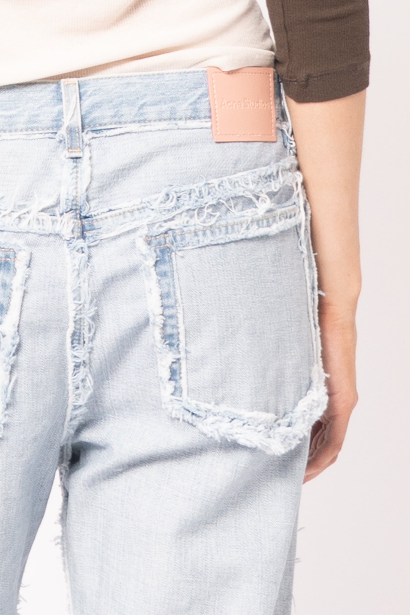 Frayed Light Blue Denim Jeans