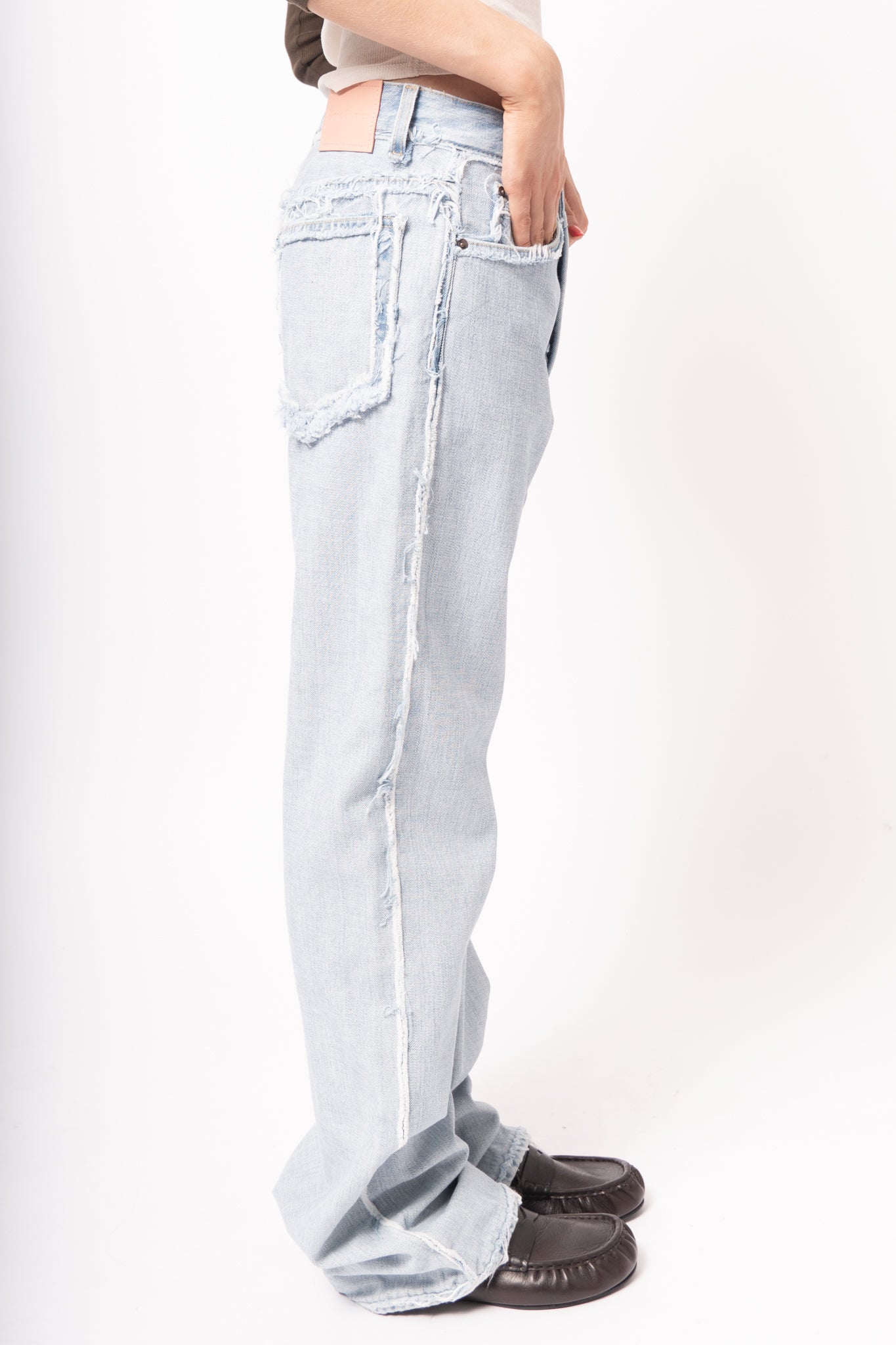 Frayed Light Blue Denim Jeans